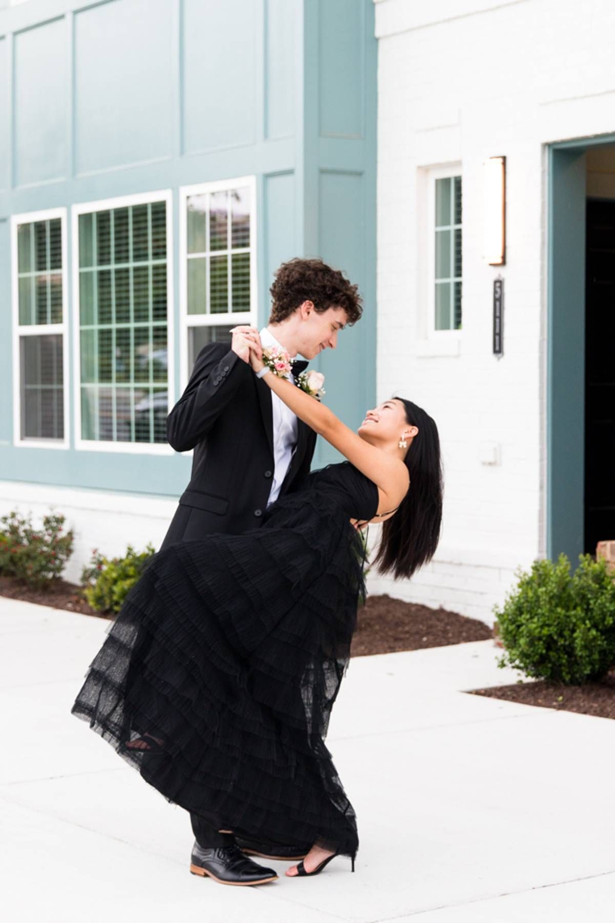 RVA Richmond Virginia portrait photographer. Unique portrait photography. Personality filled photography. Young couple dancing outside.