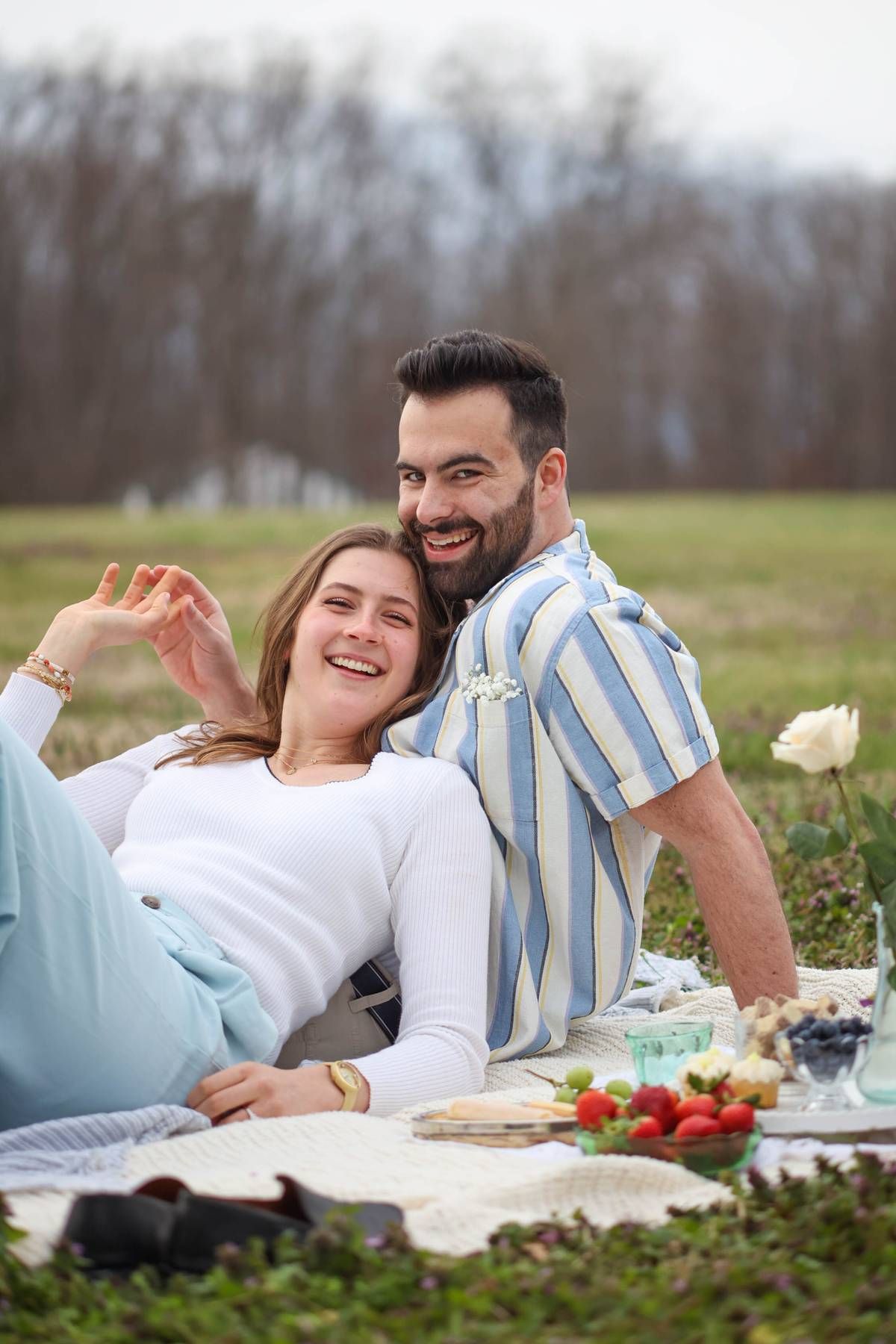 RVA Richmond Virginia portrait photographer. Unique portrait photography. Personality filled photography. Couple having fun at a picnic.