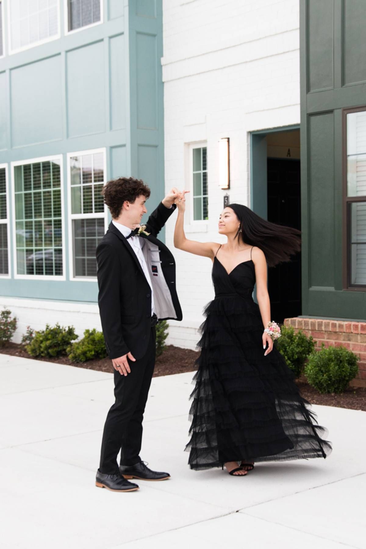RVA Richmond Virginia portrait photographer. Unique portrait photography. Personality filled photography. Young couple dancing outside.