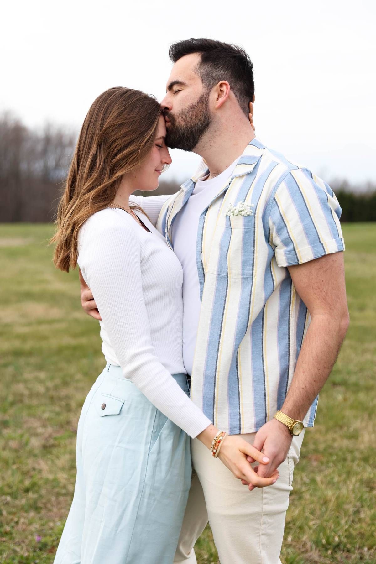 RVA Richmond Virginia portrait photographer. Unique portrait photography. Personality filled photography. Couple in blue and white. Joyful.