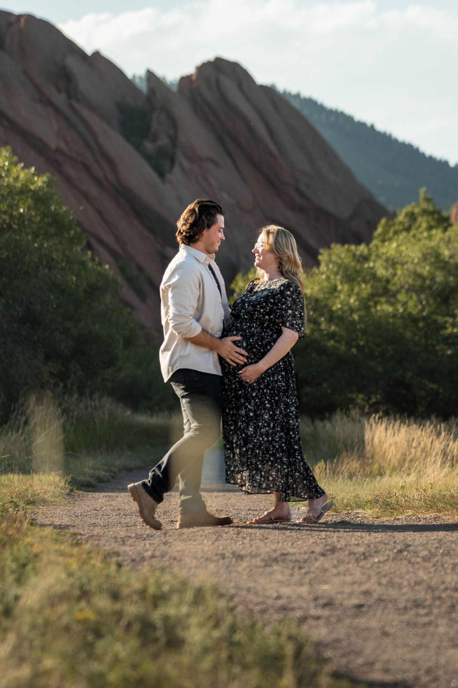 Marriage proposal scene with red rock formations in the background.