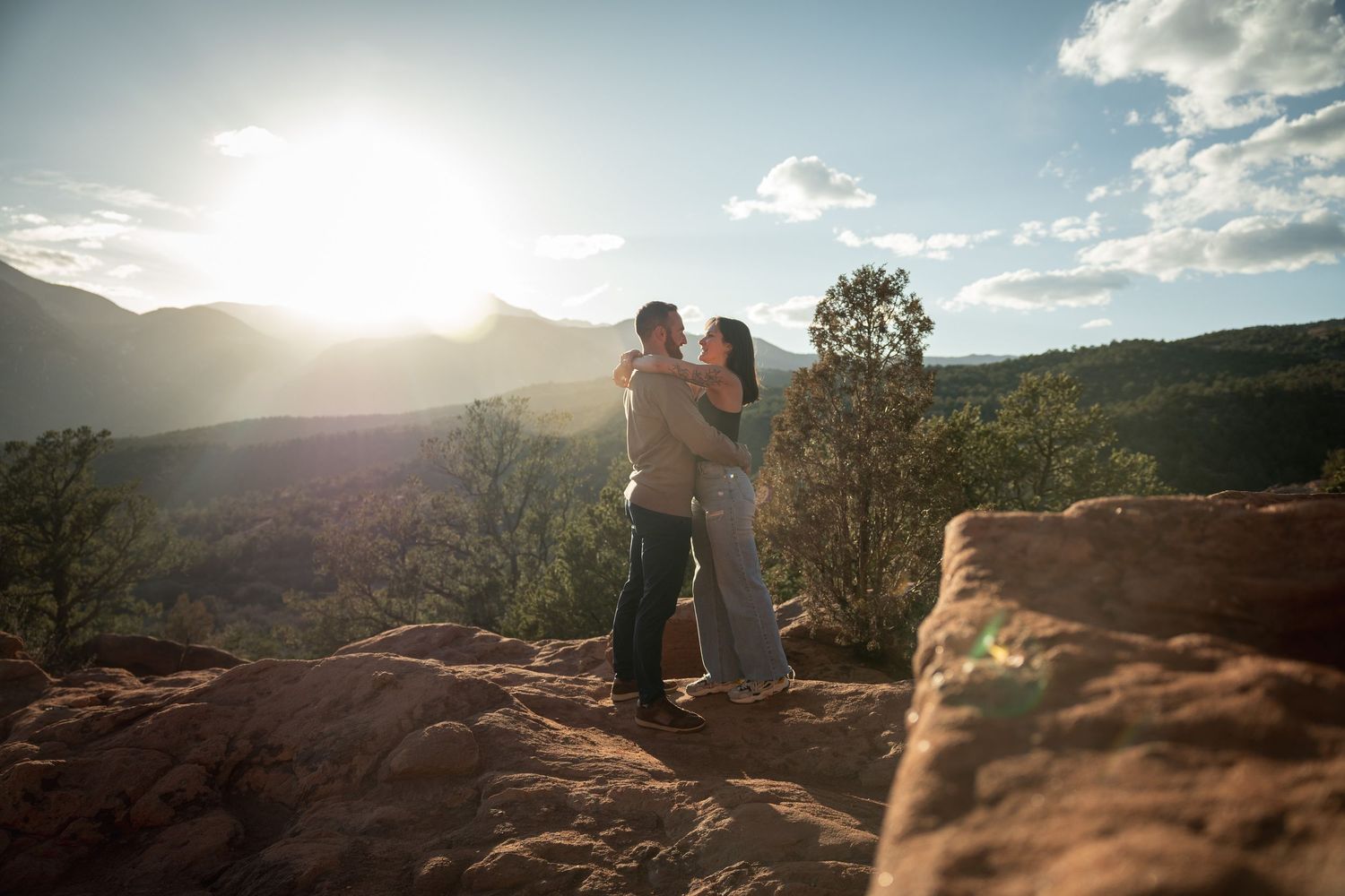 Panoramic mountain landscape shots featuring a couple during sunset.