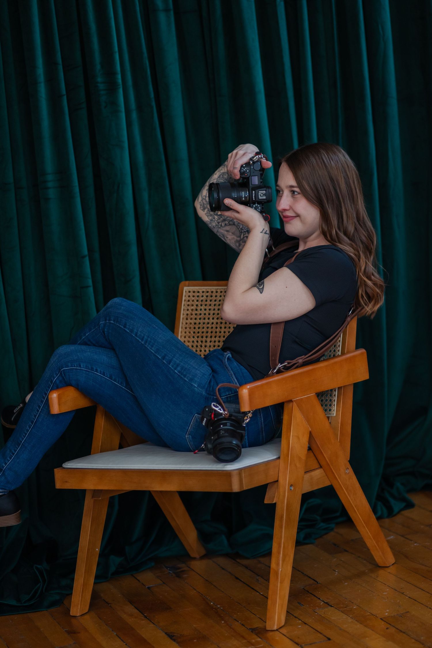 A series of photos showing someone reclining on a wooden chair against a dark green curtain backdrop.