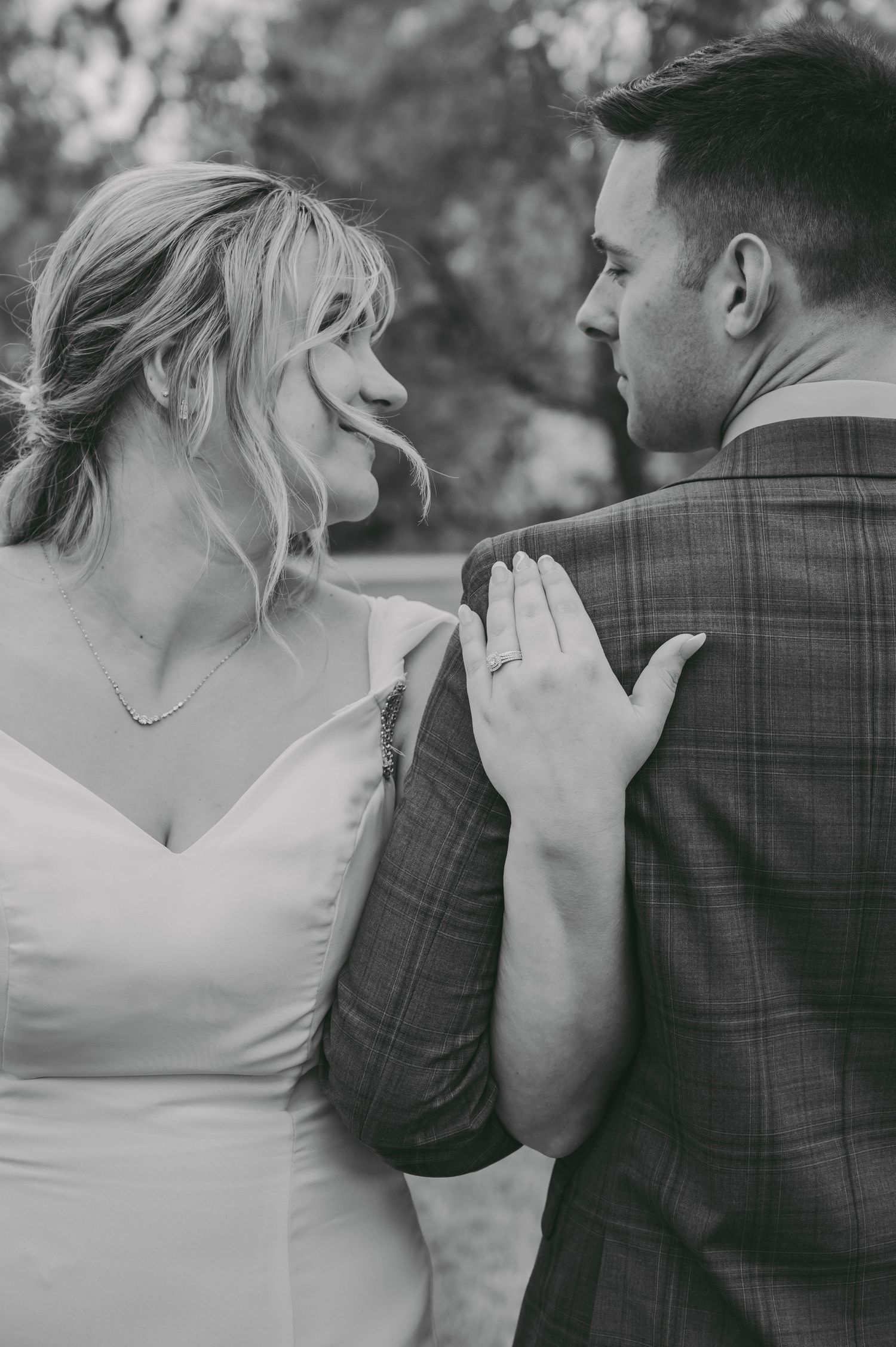 Black and white closeup of wedding couple in intimate portrait session.