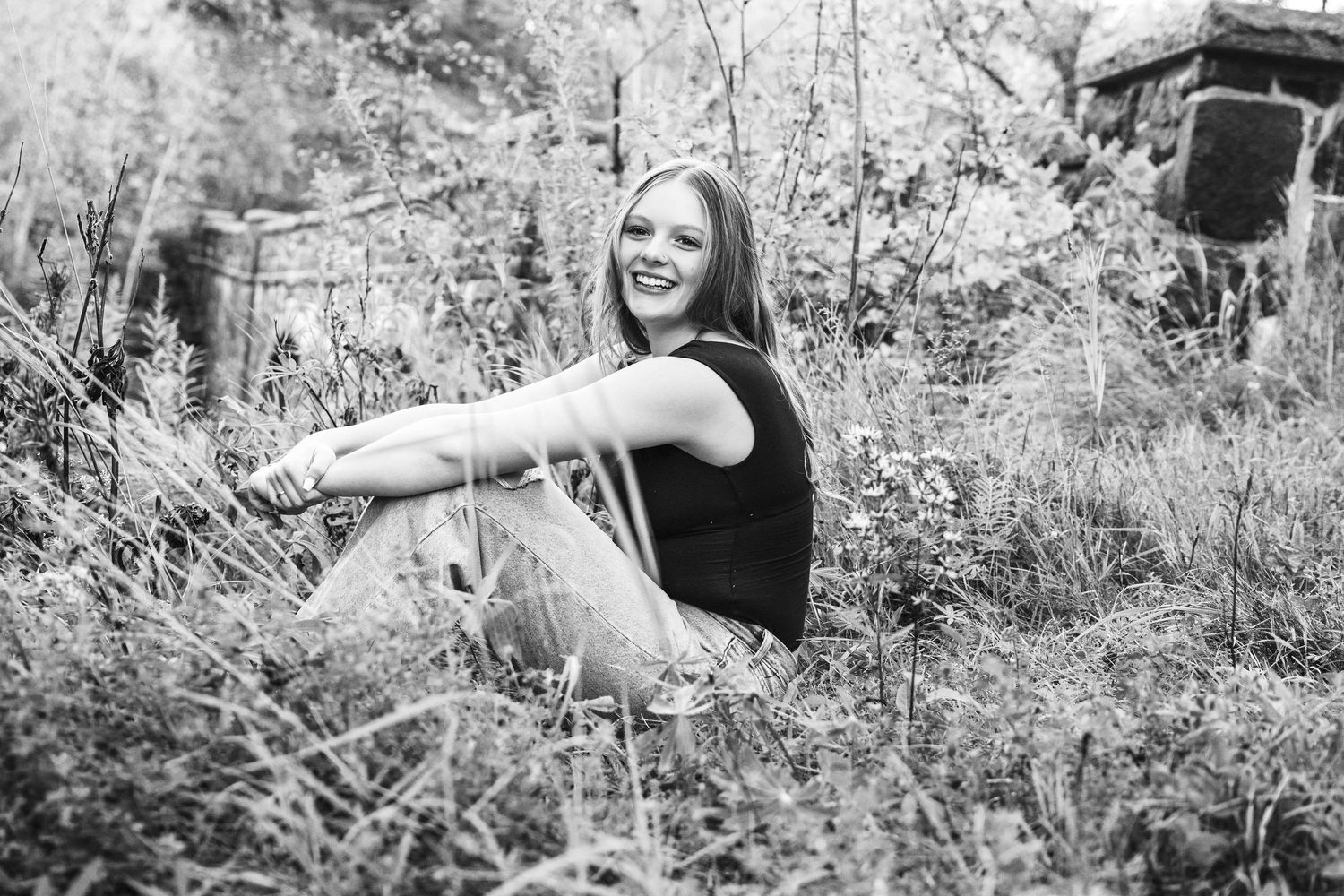 Series of candid outdoor photography shots showing joyful expressions against a forest backdrop.