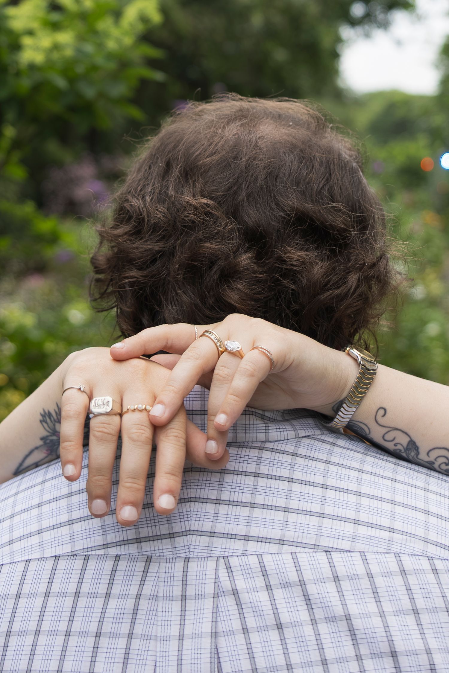 Candid moment of couple laughing together after proposal – NYC surprise engagement session by Laura Mahl