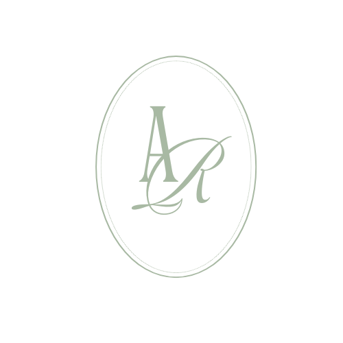 Simple silver jewelry monogram alphabet set on white background with circular design elements.
