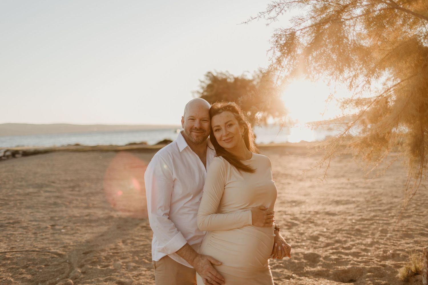 Family Photographer Dubrovnik Split Hvar Croatia
Bride and groom embracing on the beach with the sea as their backdrop in Split
