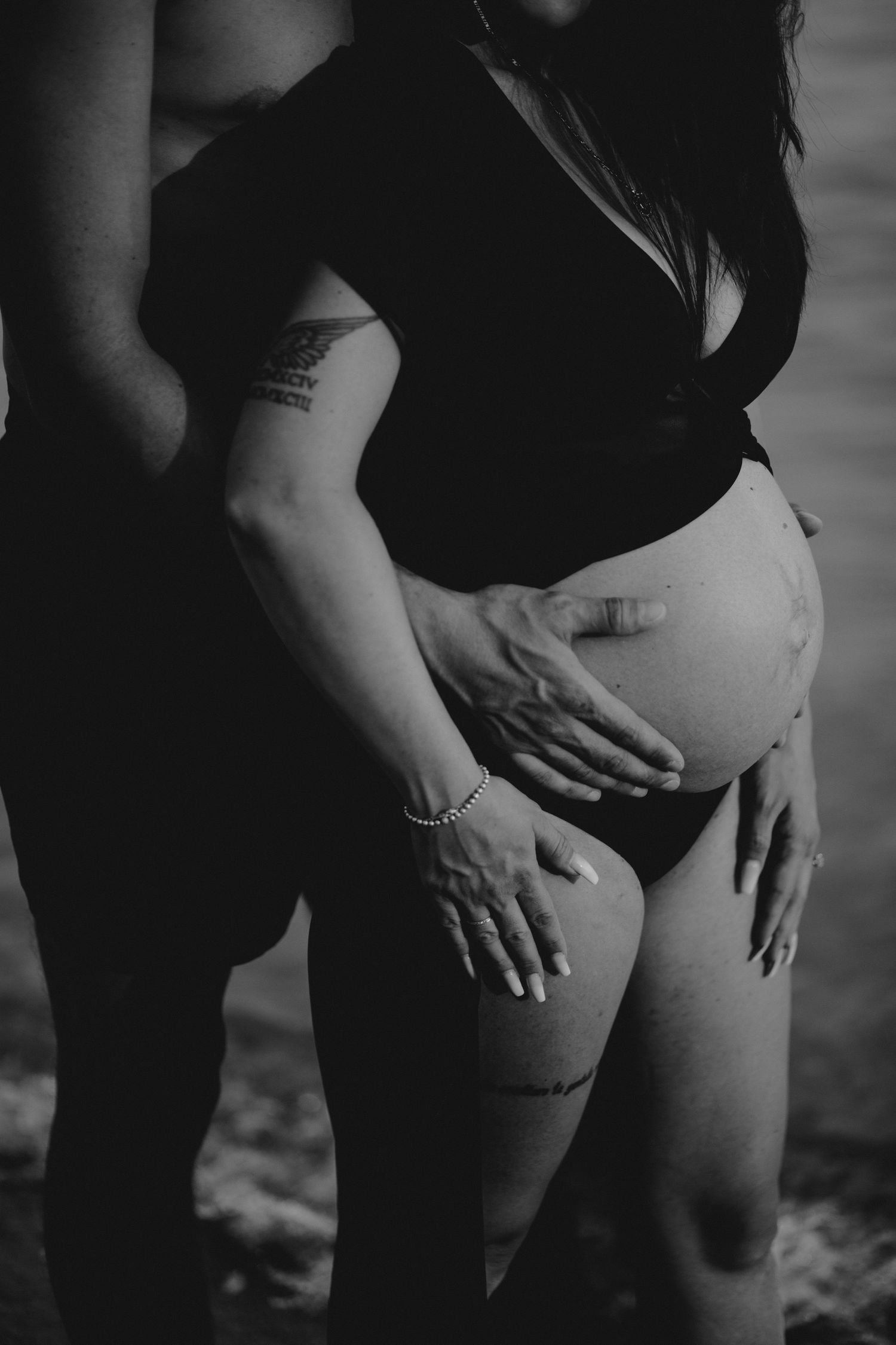 Couple Photographer Dubrovnik Split Hvar Croatia
Pregnant woman holding her belly during a sunset beach maternity shoot in Croatia