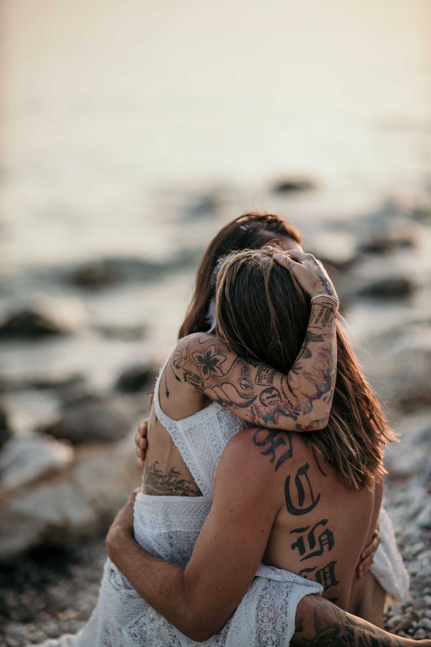 Hvar Engagement photographer Croatia
Engaged couple embracing at golden hour on the sandy shore in Croatia