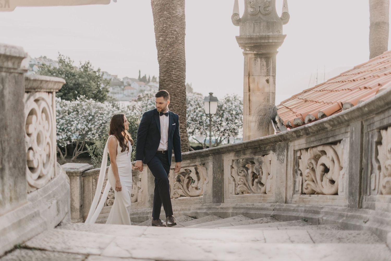 Split elopement photographer Hvar  Dubrovnik
Wedding couple walking hand-in-hand along the shores of Korcula