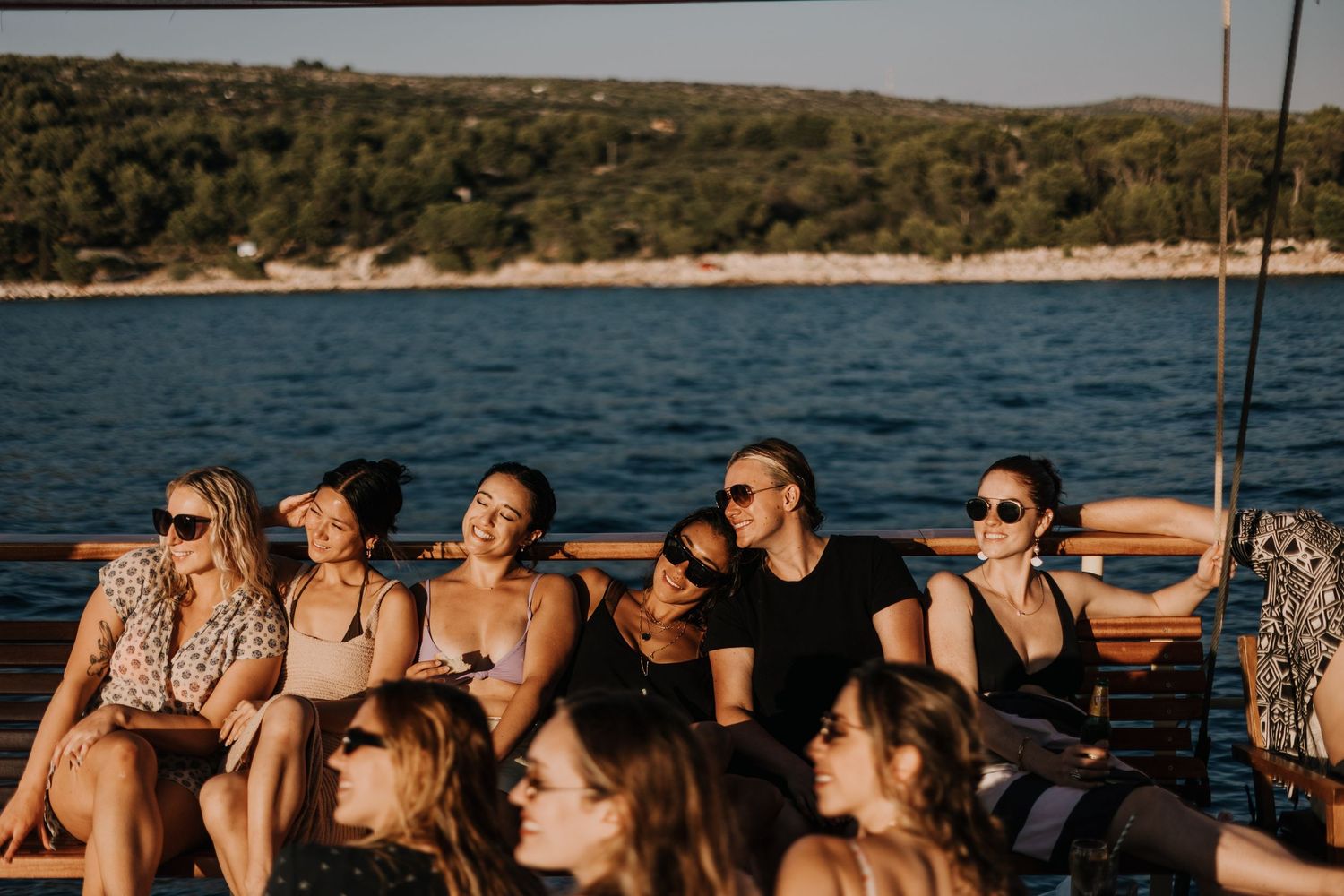 Croatia Vacation Photographer Hvar Vis Split
Friends capturing memories on a boat tour near the islands of Vis