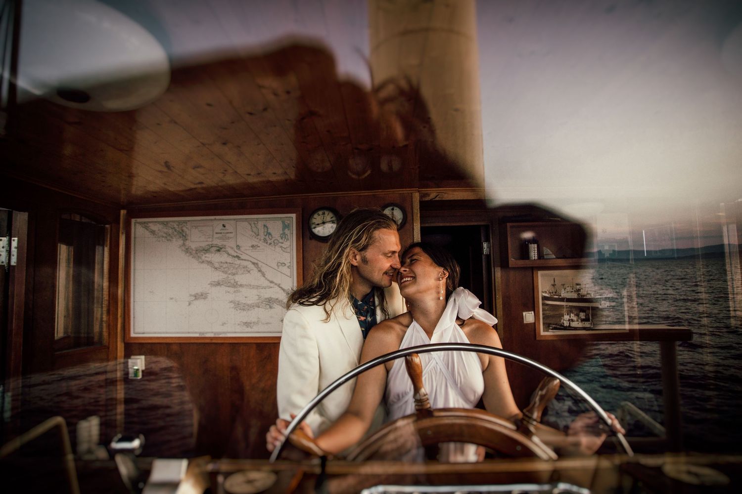 Elopement Photographer Hvar Vis Split Croatia
Wedding couple laughing together while cruising on the boat  Polaris Croatia
