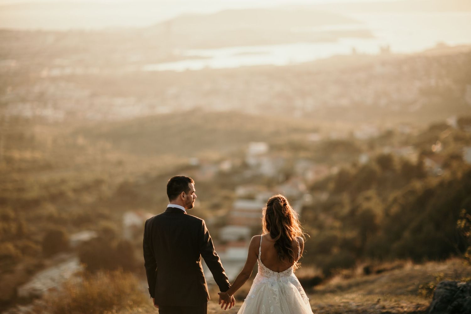 Vacation Photographer Dubrovnik Split Hvar Croatia
Bride and groom sharing a quiet moment by the sea after their beach ceremony in Split