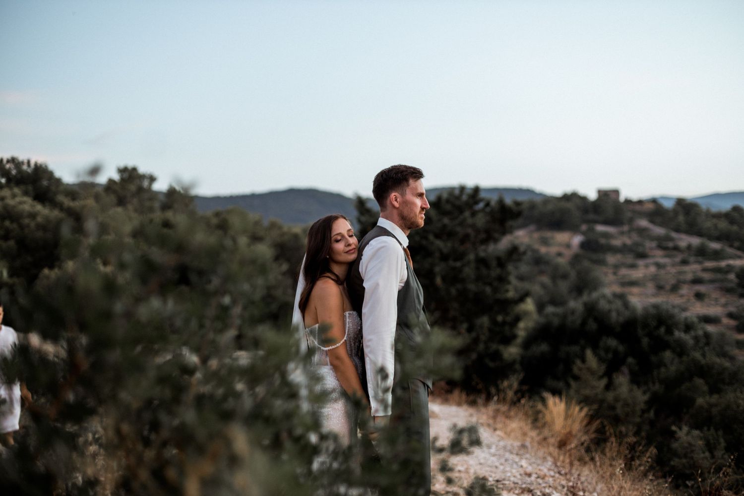 Split Hvar  Dubrovnik Elopement photographer 
Wedding couple walking hand-in-hand along the shores of Vis