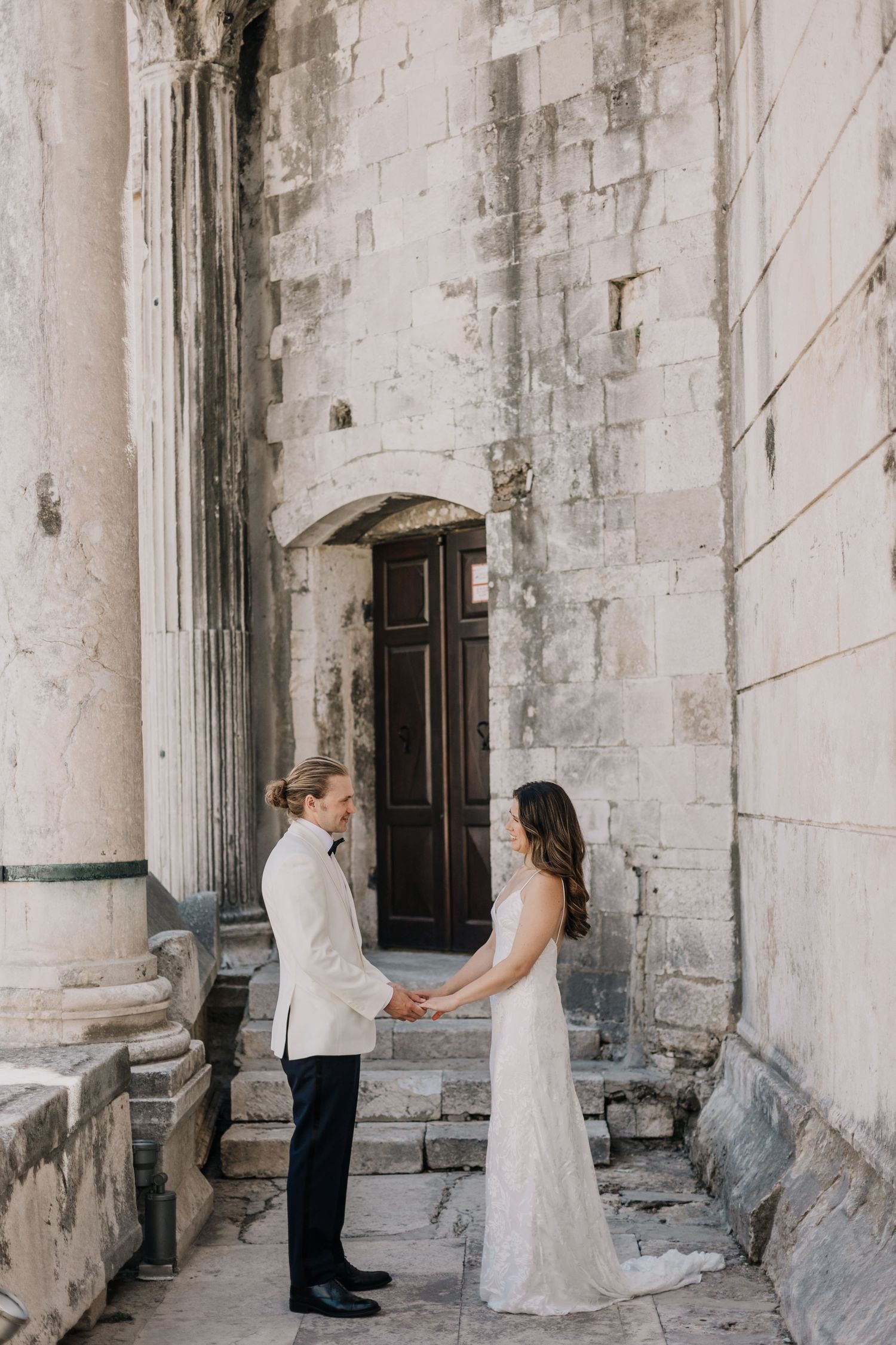 Elopement Photographer Hvar Vis Split Croatia
Engaged couple posing on the cobblestone streets of Split's Old Town