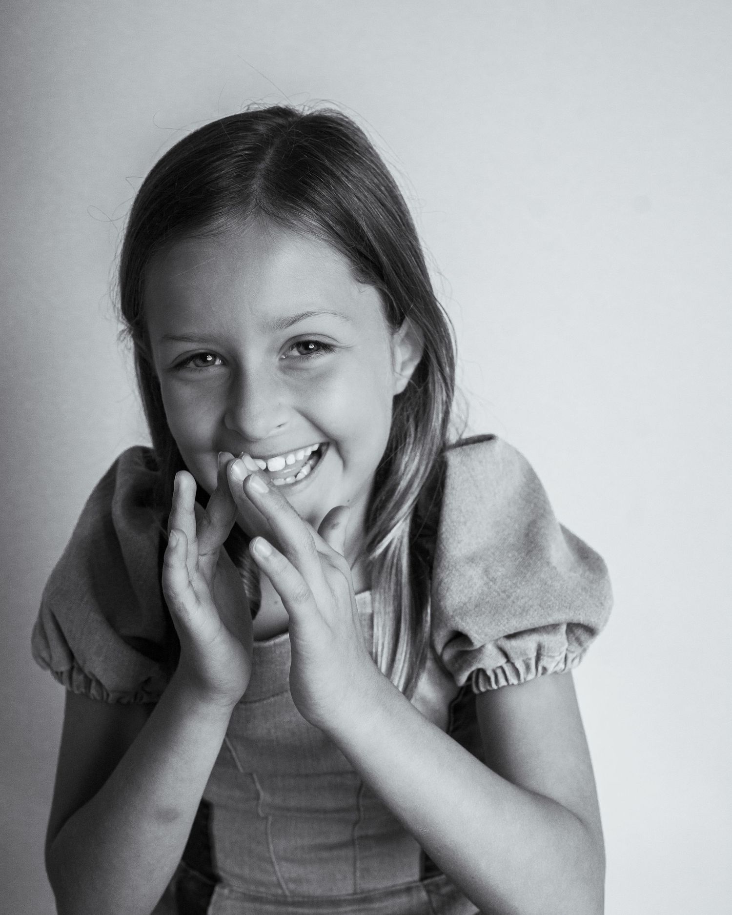 Candid, character-filled portraits of kids being exactly who they are. Real expressions. Real personality.