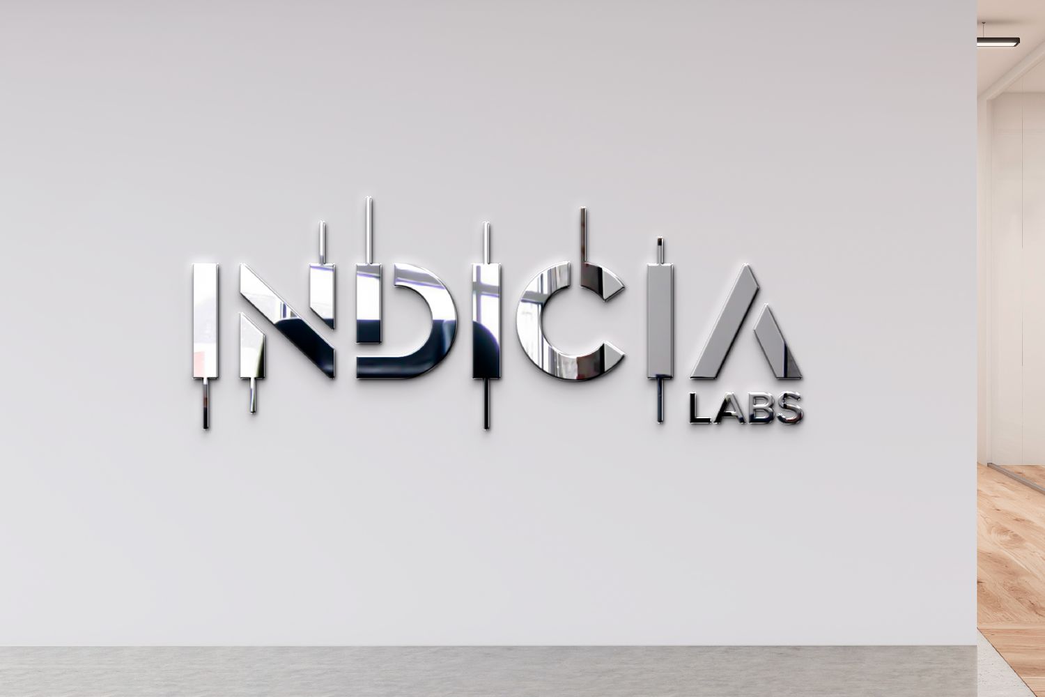 Branded entry wall at Indicia Labs featuring company logo and sleek, minimalist interior design