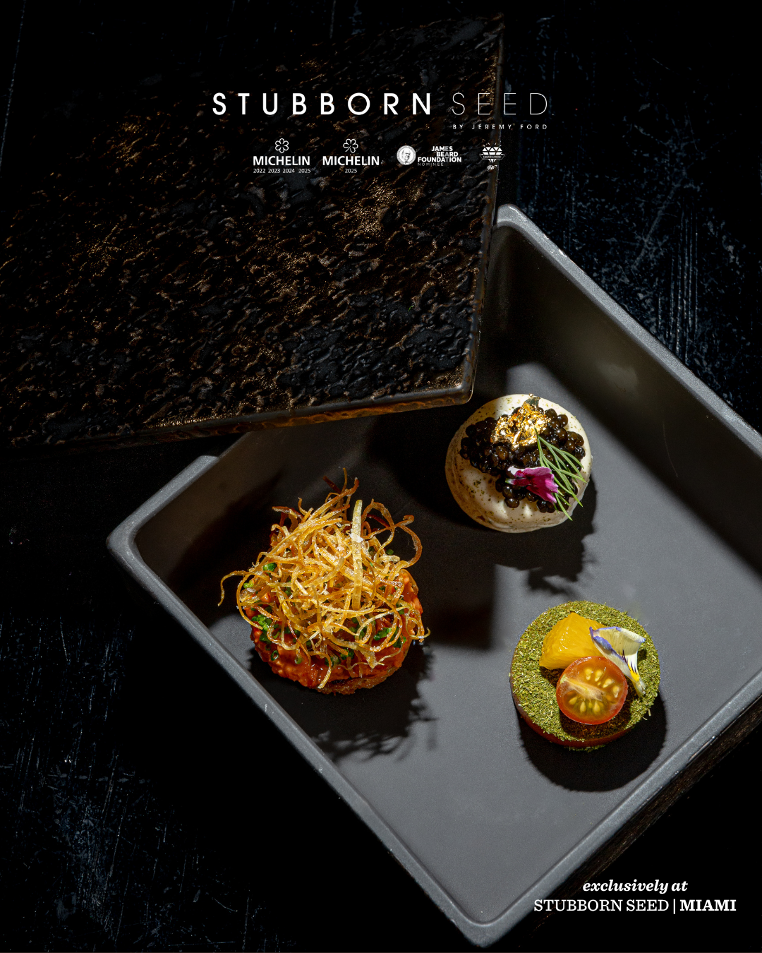 Gourmet appetizer plate featuring noodles and small bites at Stubborn Seed restaurant.