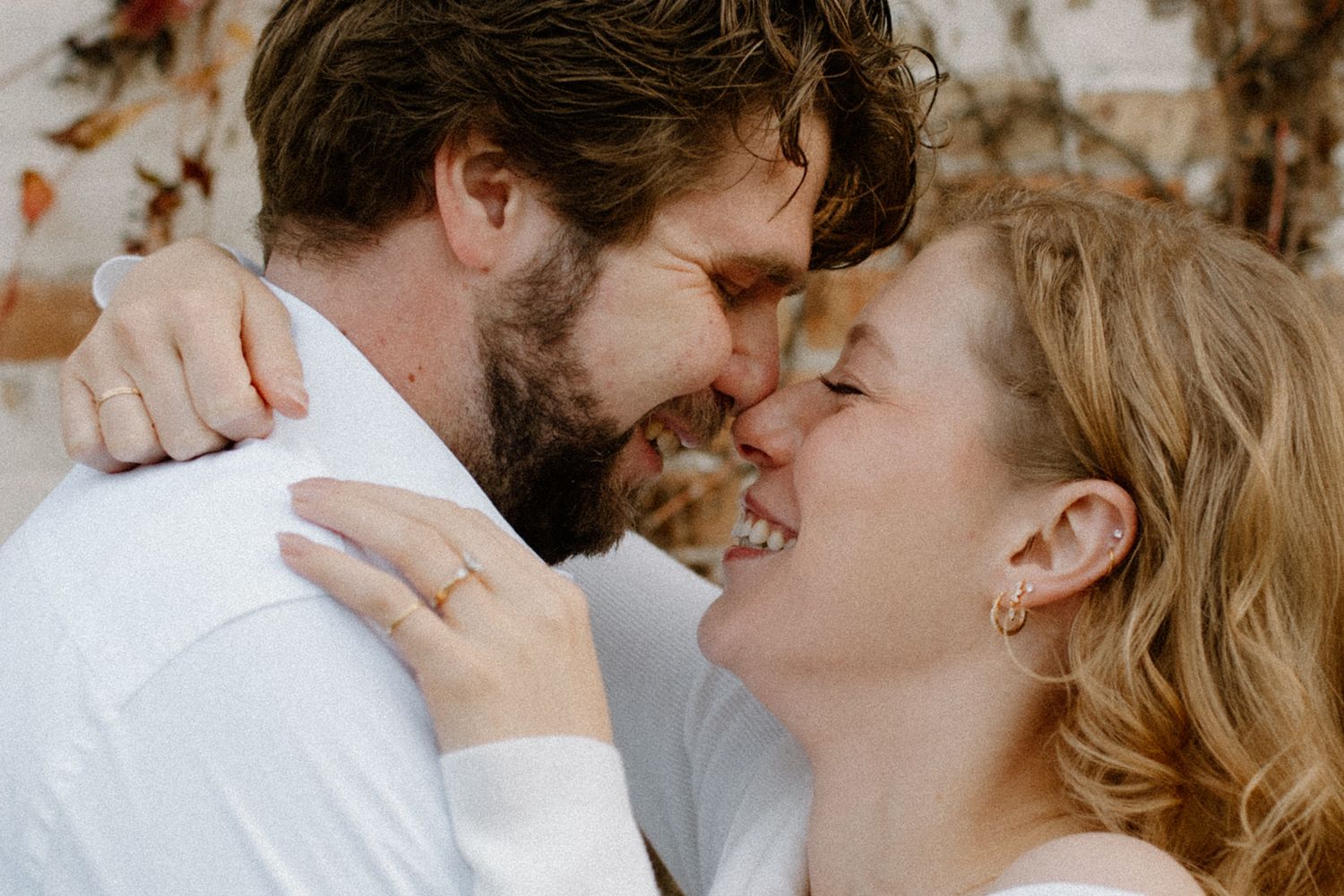 Close-up shots of a couple sharing tender moments and laughter together during Wisconsin engagement session