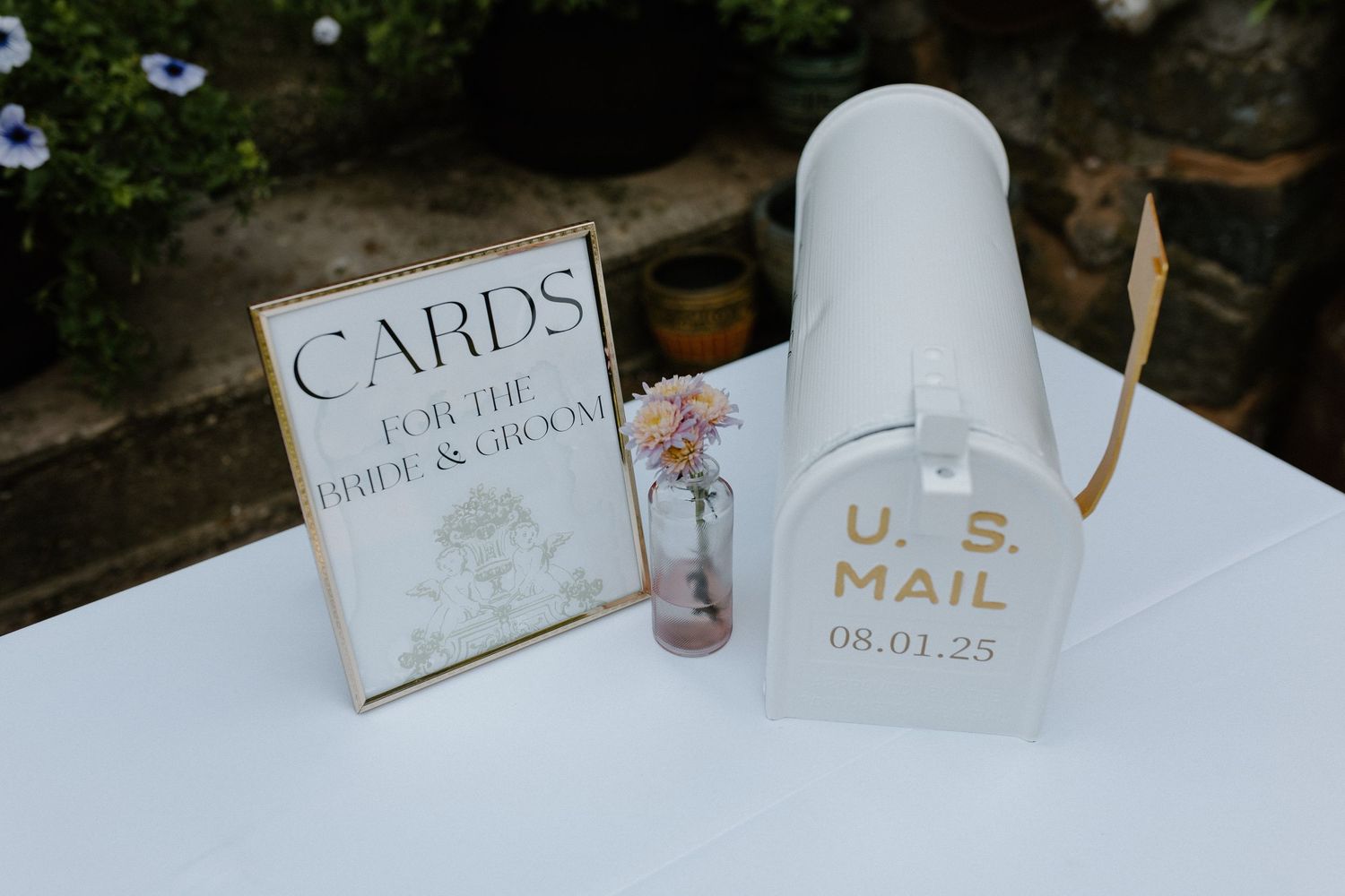 Wedding stationery and invitation details with postage stamps and cards at garden wedding in Wisconsin