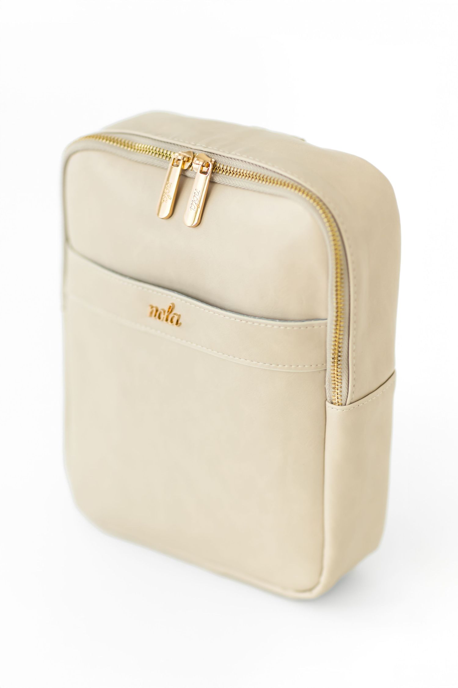 Elegant cream colored leather backpack with gold zipper and minimal design shown from front view.