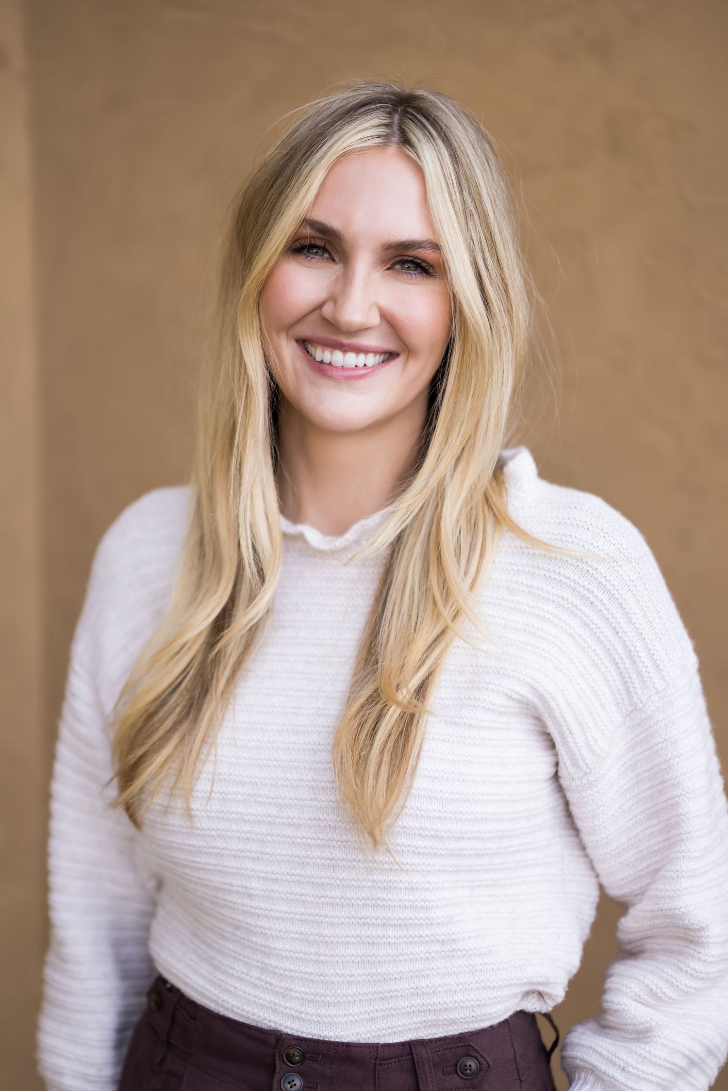 Warm, professional headshot taken in Salt Lake City, Utah