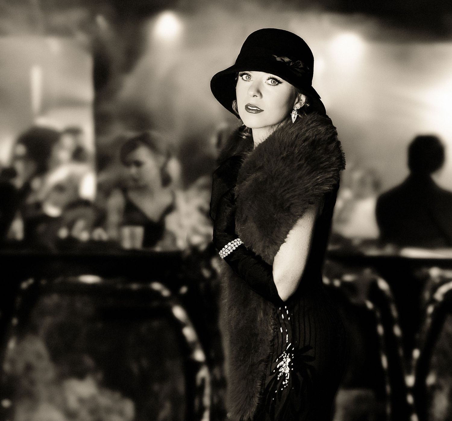 Artistic black and white fashion photography series with dramatic lighting and shadows.