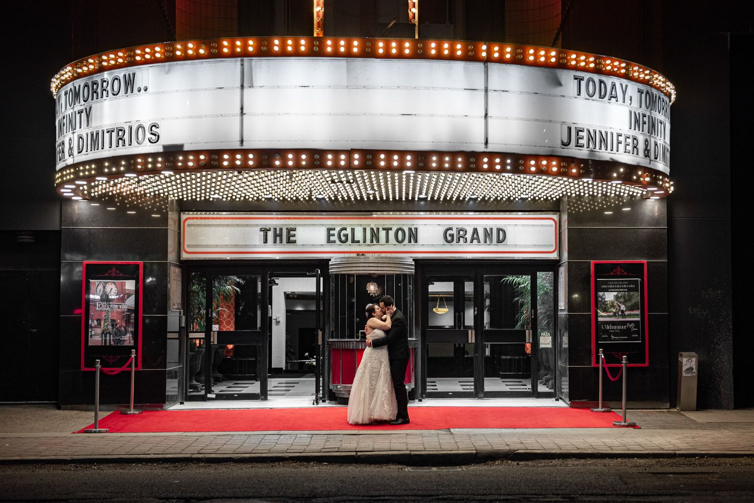Bride and groom outside The Eglinton Grand. Elegant Toronto wedding photography and iconic venue portraits.