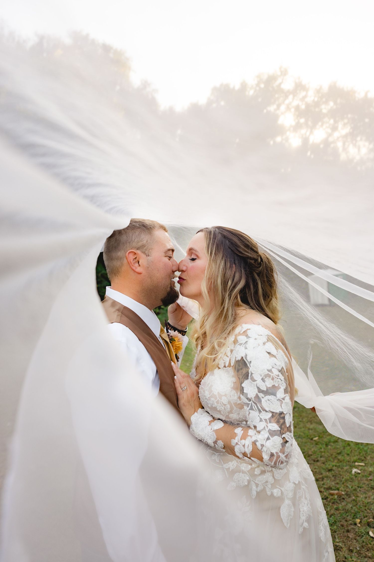 Wedding and engagement photographer based in Dubuque, Iowa capturing natural, timeless moments.