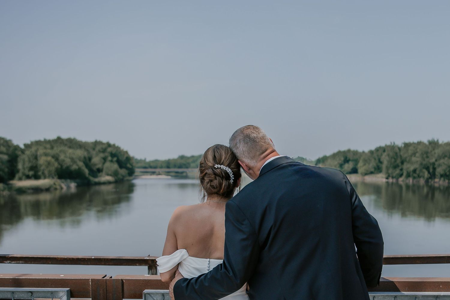 Wedding and engagement photographer based in Dubuque, Iowa capturing natural, timeless moments.