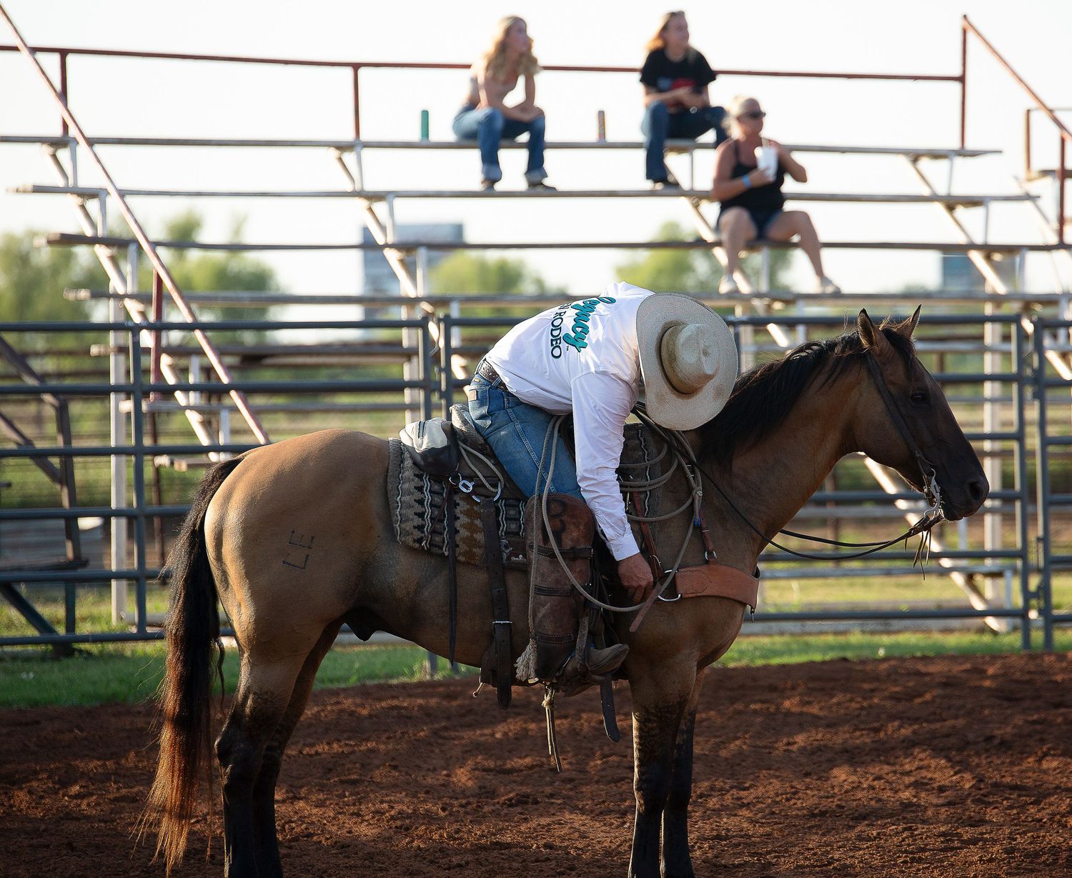 Professional rodeo photography in Oklahoma – action-packed moments of cowboys, bull riding, and barrel racing by R&T Photography