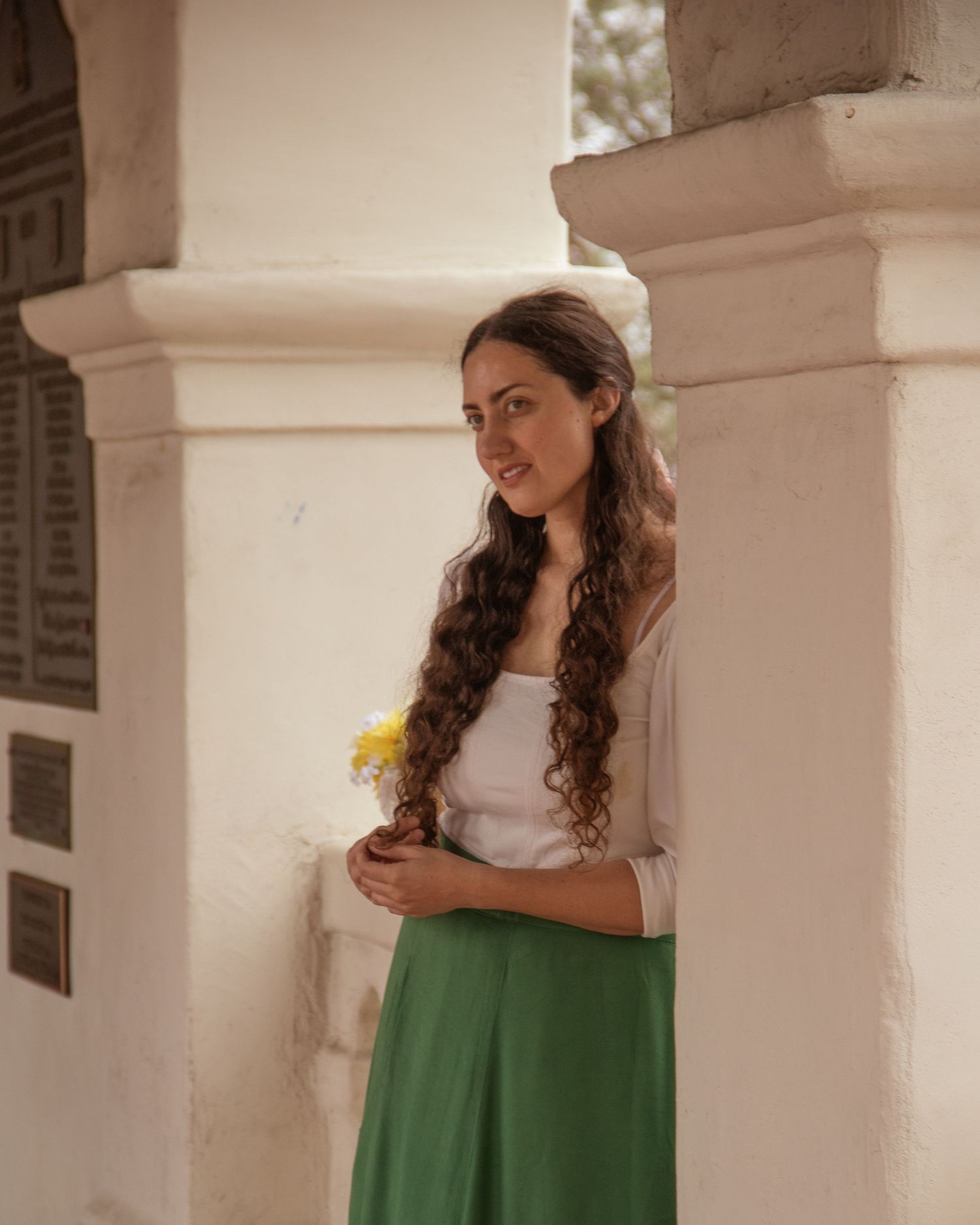 Woman in green skirt posing outdoors at Balboa Park | Nuvue Visuals portrait photography in San Diego Presidio Park