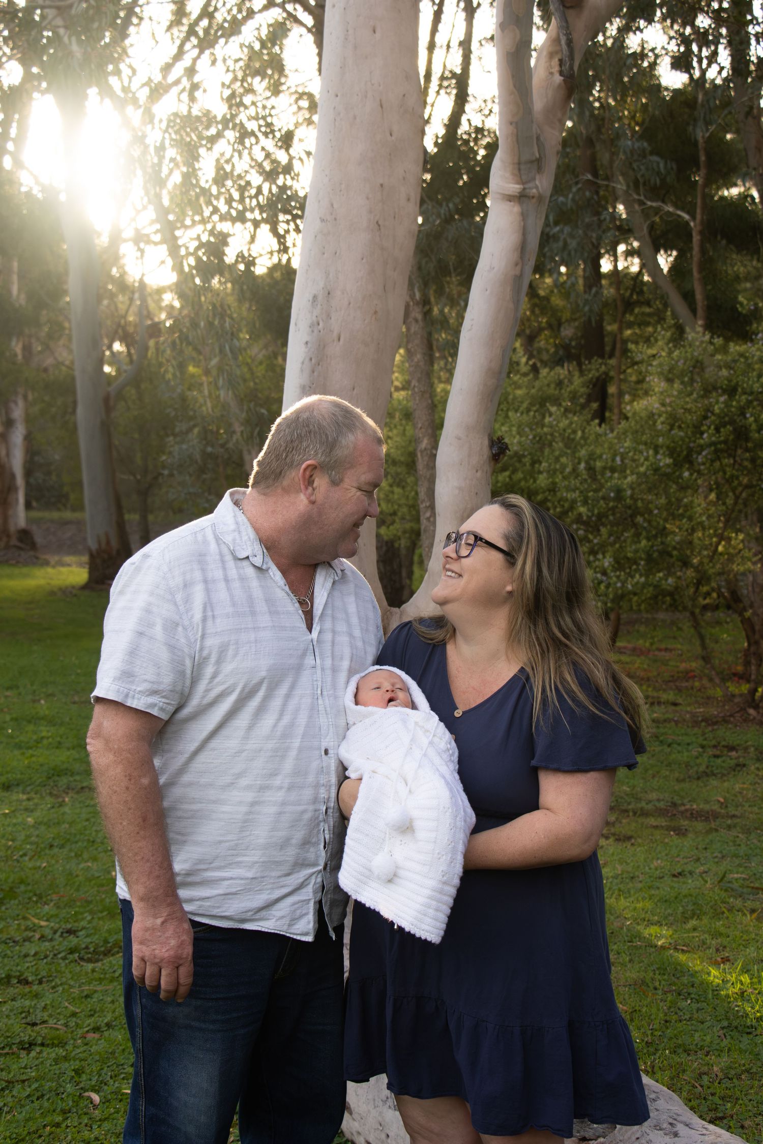 Candid, natural, close up newborn photos at sunrise on a property in Albany