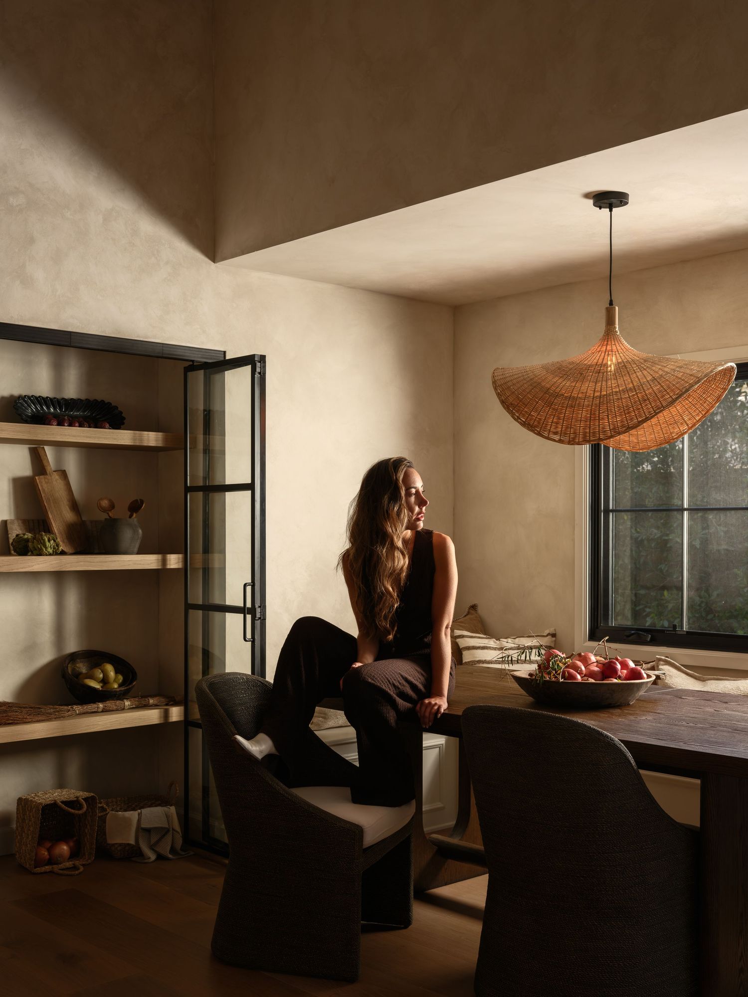 San Diego real estate and lifestyle interior design photography featuring a female model in natural light against limewashed walls