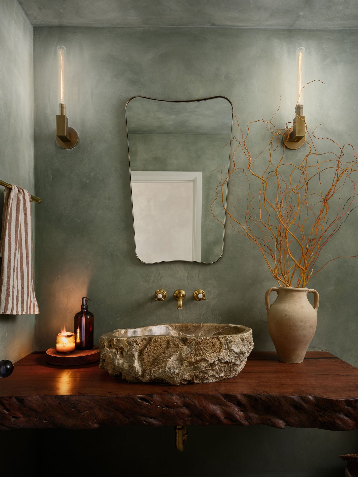 ROAM stone sink bathroom with limewash walls shot by a San Diego interior photographer highlighting organic design details and warm styling