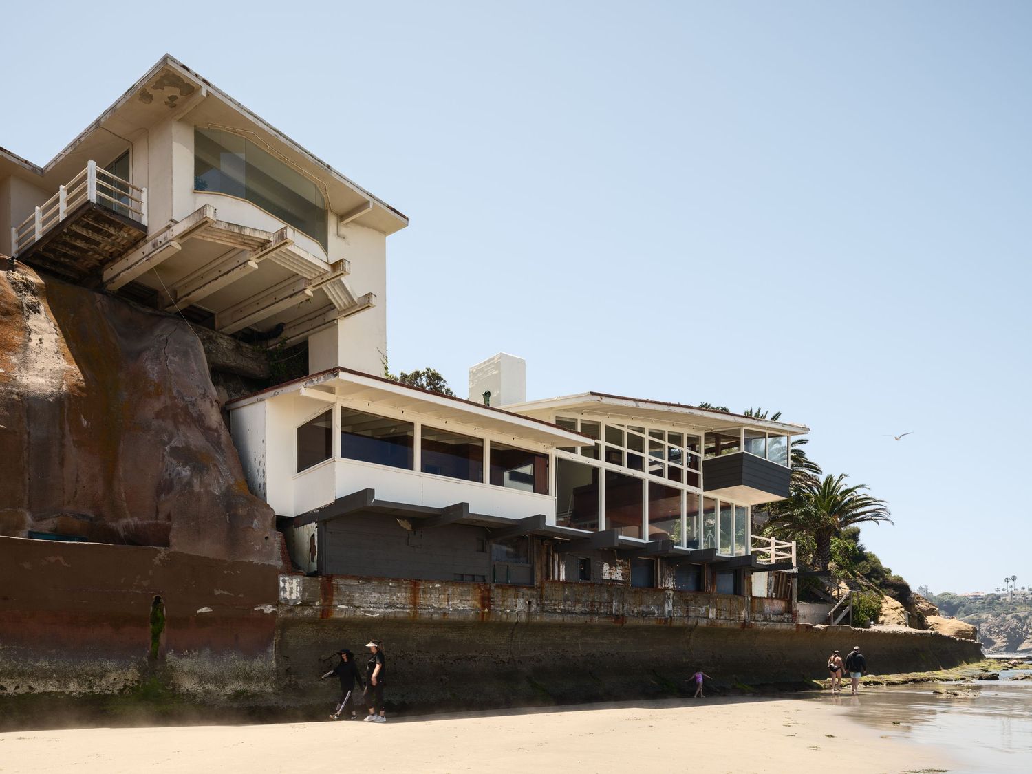 Dramatic cliffside exterior of 1890 Spindrift Drive by architect William Kesling, cantilevered above the shoreline in La Jolla.