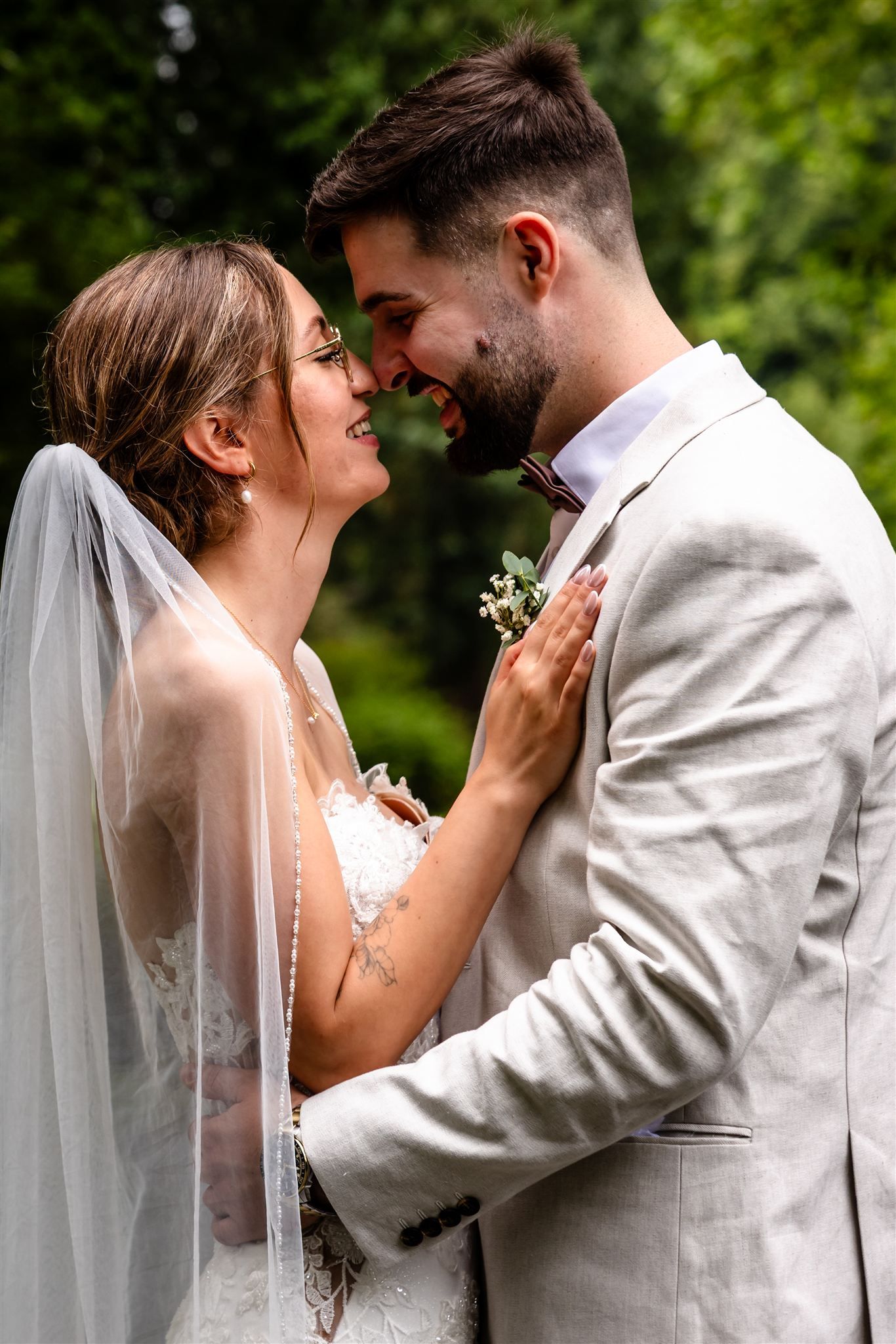 A romantic sequence of wedding photos showing tender moments between a bride and groom in an outdoor garden setting.
