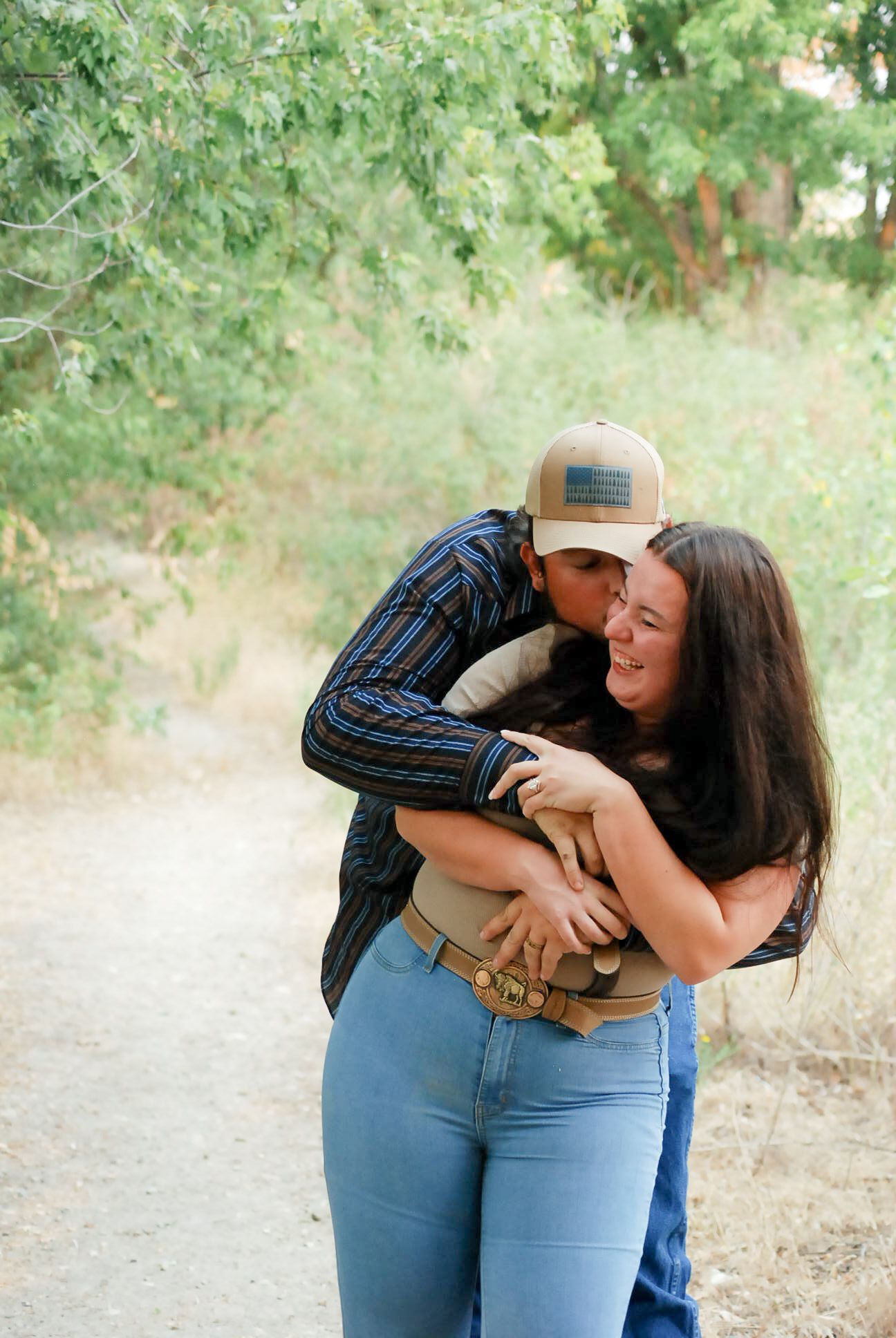 A couple shares laughs and embraces in a series of candid outdoor photos.