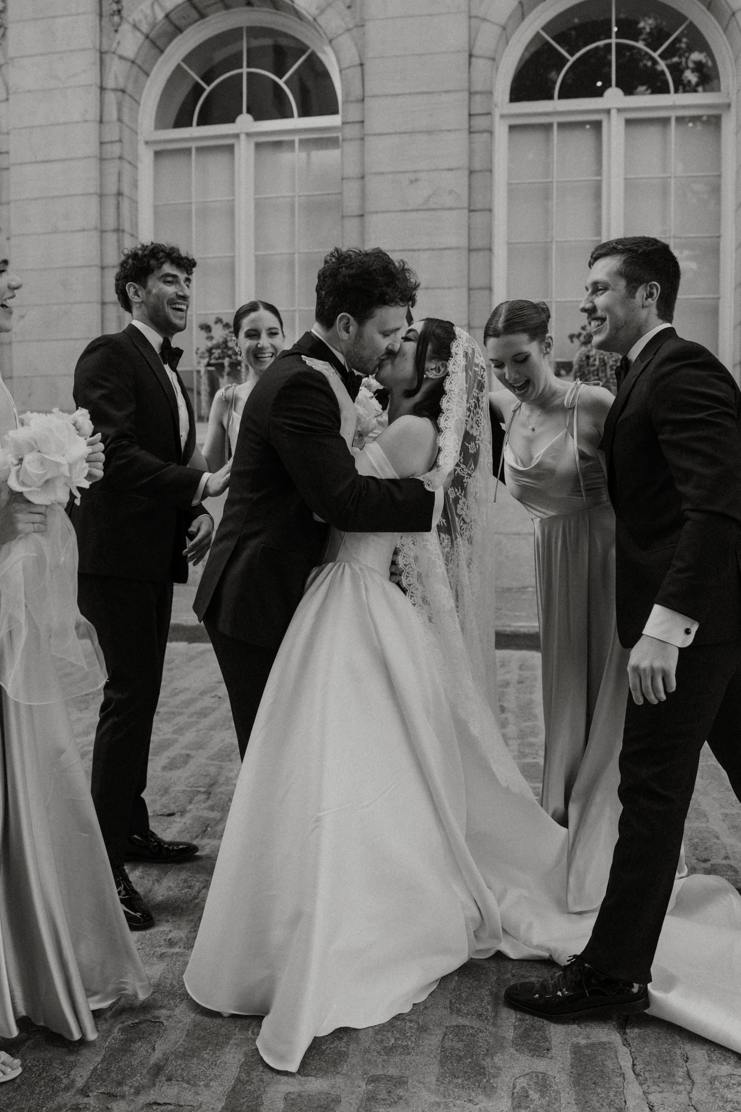 Wedding reception dance sequence showing couples twirling in formal attire.