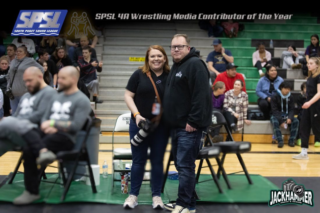 Man and woman pose together at SPSL 4A Wrestling Media Contributor of the Year award event.