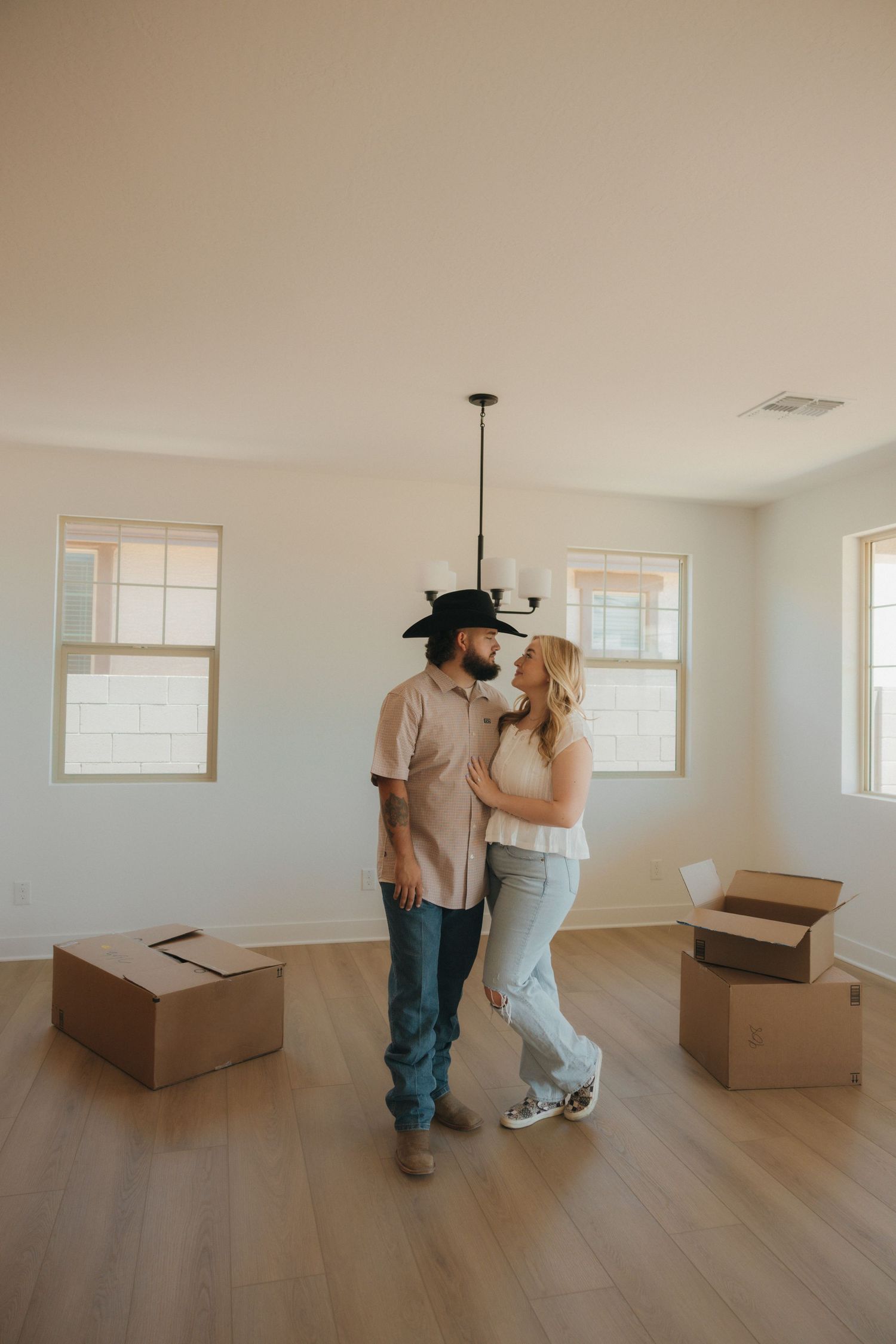 New home celebration photo from this couples session.