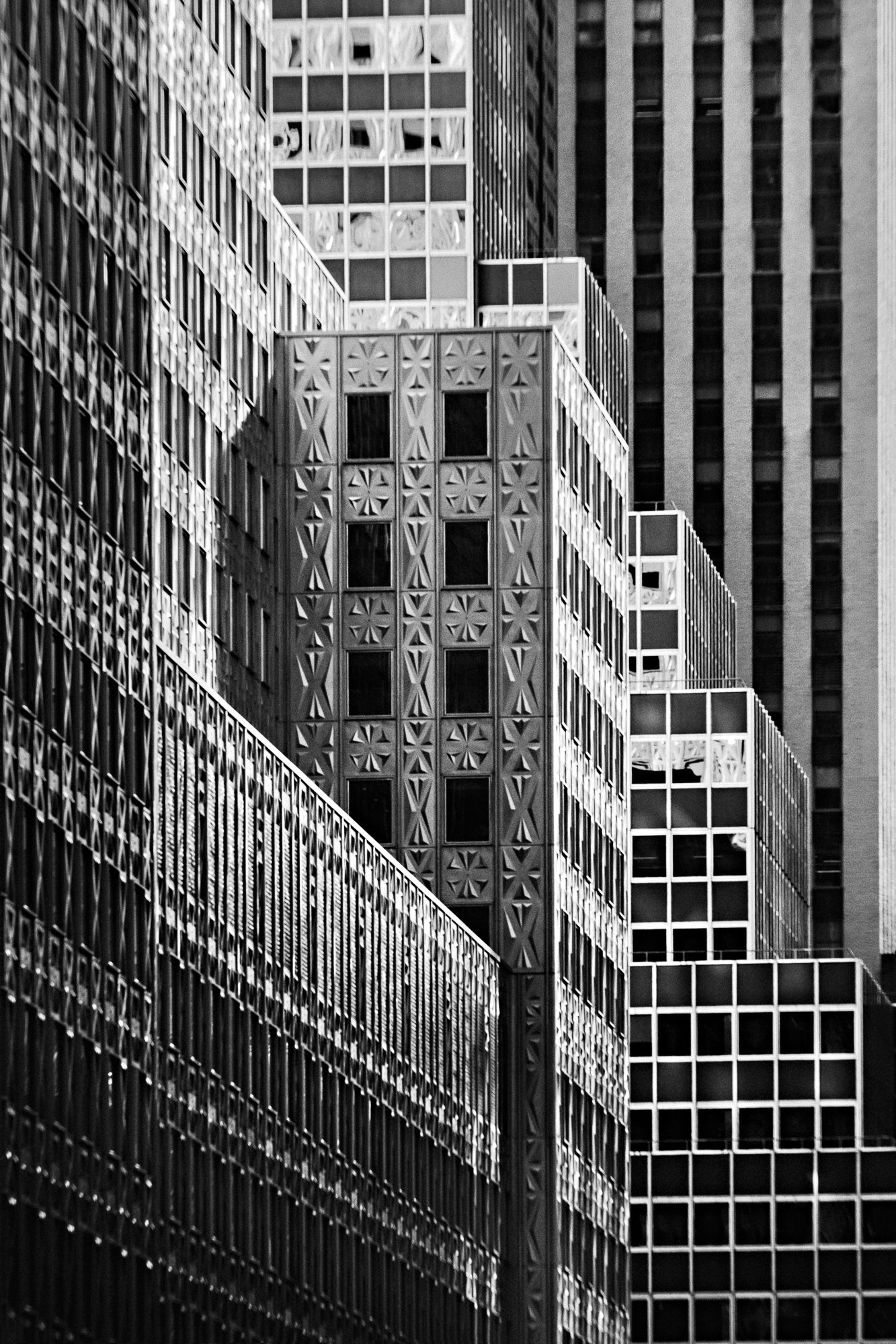 Abstract architectural pattern of modern building windows and geometric shapes in black and white.