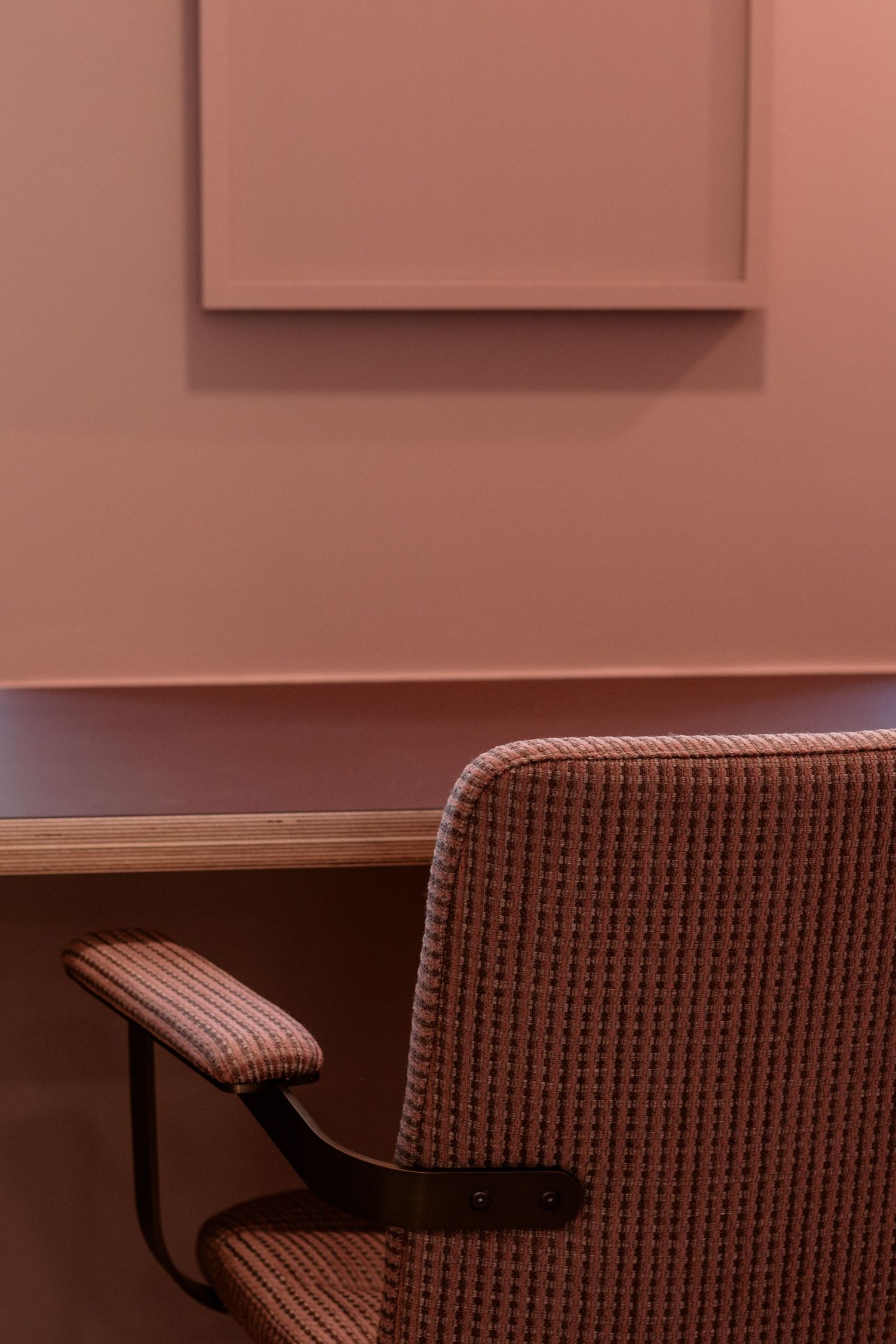 Brown textured seating arrangement with contemporary design elements.
