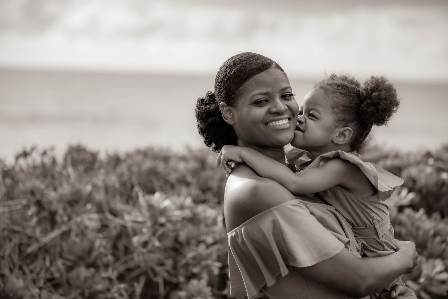 Black and white series of tender embraces and intimate moments between two people.