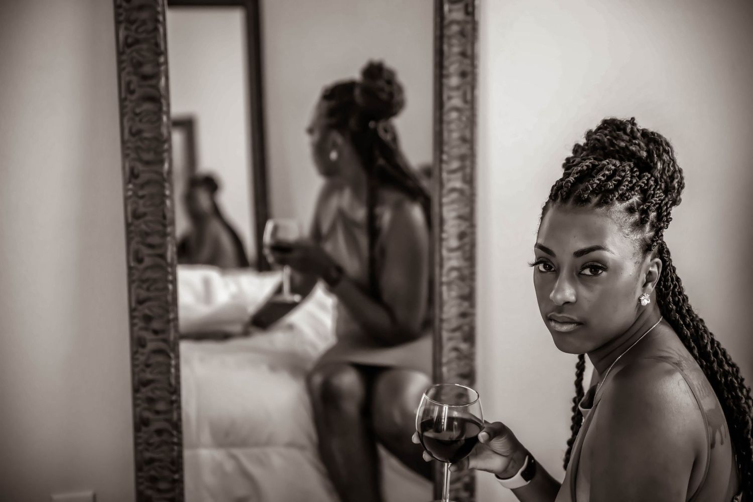 Artistic black and white boudoir photography sequence showing intimate poses.