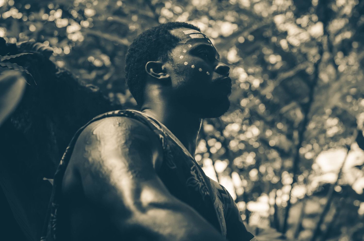 Atmospheric portrait sequence with dramatic lighting and shadows.