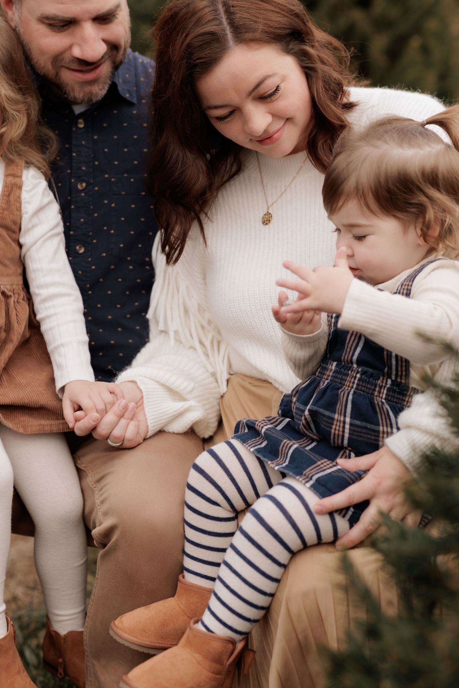 Intimate family moments captured in a series showing tender interactions and cuddles.