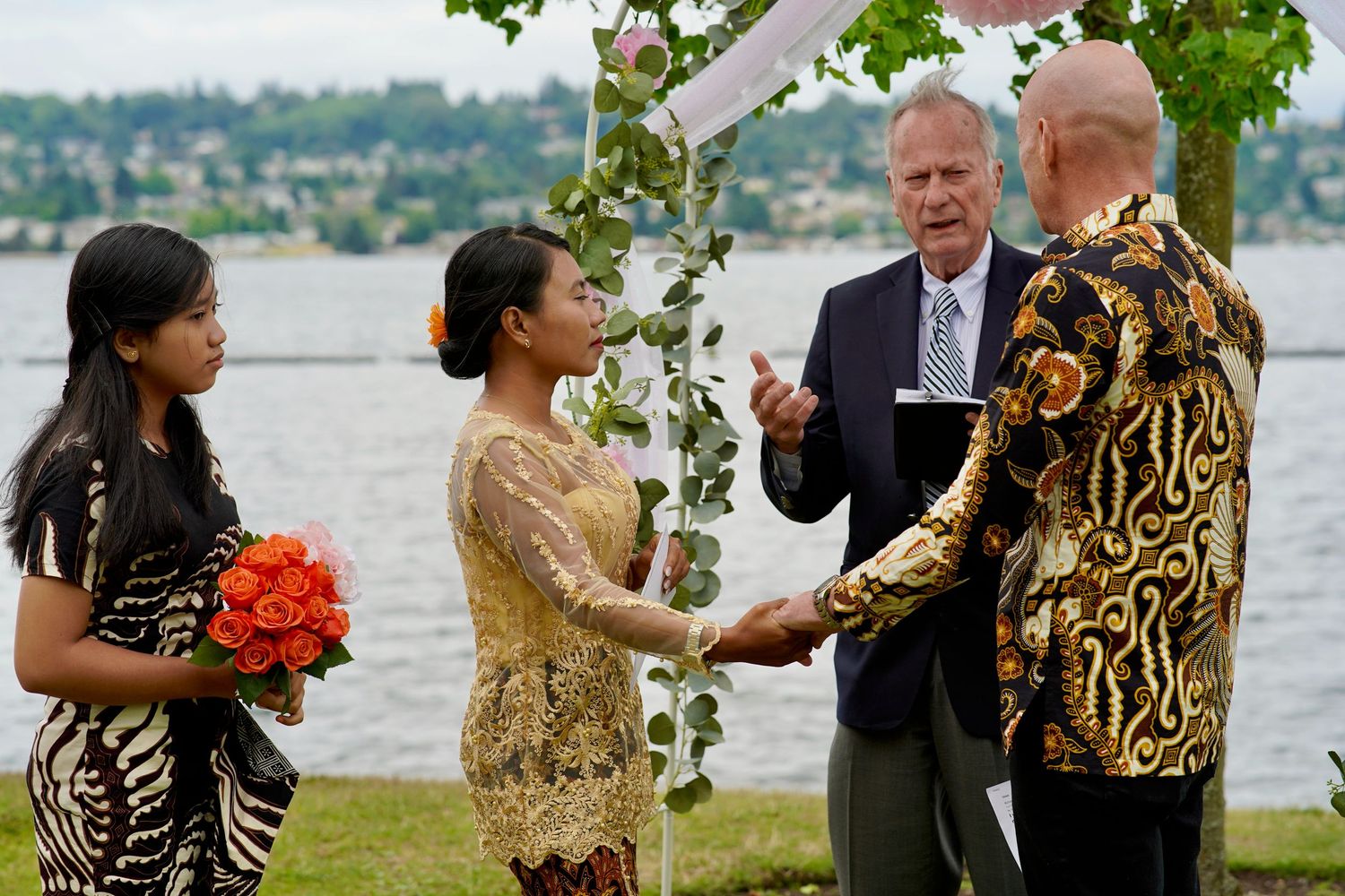 Bride and groom sharing a moment during an intimate wedding ceremony in Port Townsend, Washington