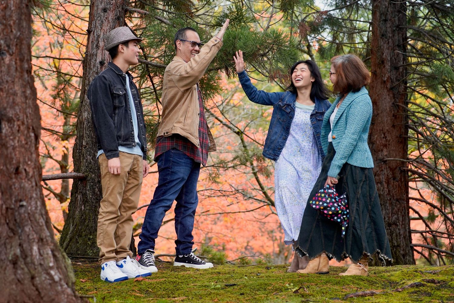 Family enjoying a relaxed outdoor photo session in Port Townsend, Washington